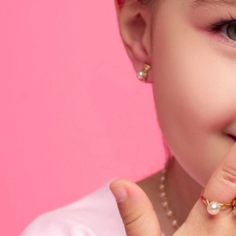 ANEL INFANTIL PÉROLA BANHADO A OURO