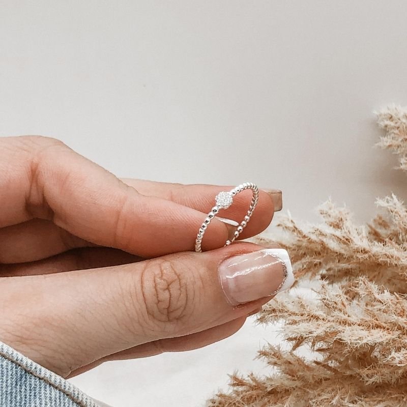 ANEL PRATA 925 TORCIDO COM TREVO