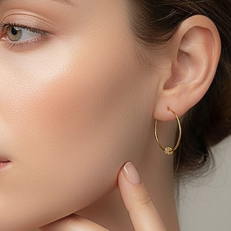 ARGOLA COM CRISTAL BANHADA A OURO