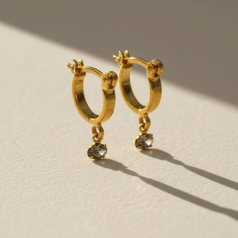 ARGOLA COM CRISTAL BANHADA A OURO 18K