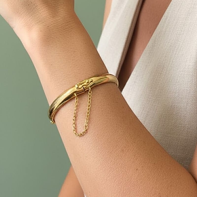 BRACELETE LISO LARGO COM PEGA LADRÃO