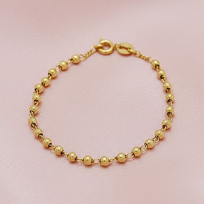 PULSEIRA BOLINHAS BANHADA