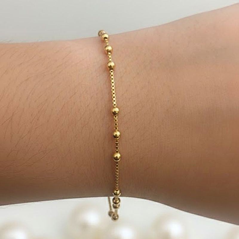 PULSEIRA COM BOLINHAS BANHADA