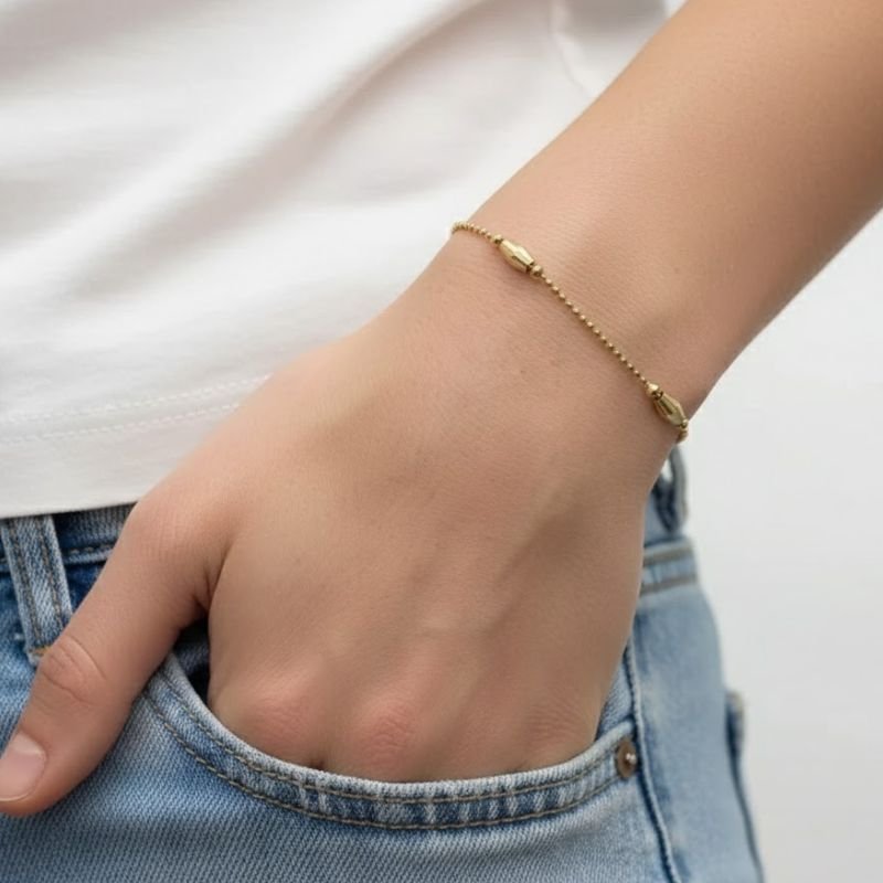 PULSEIRA COM BOLINHAS BANHADA A OURO 18K