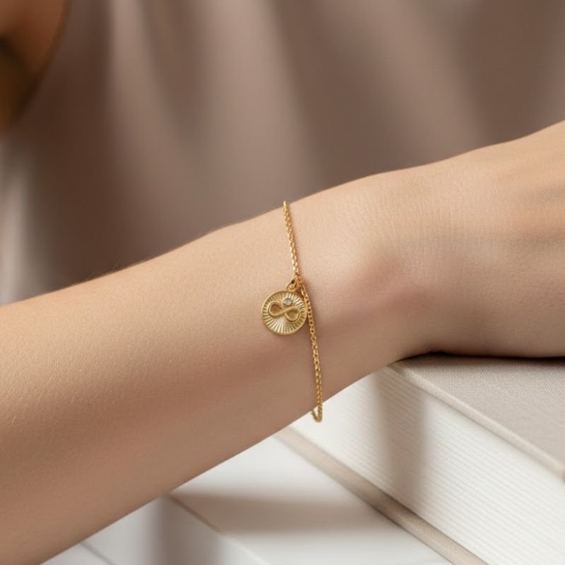 PULSEIRA COM INFINITO BANHADA A OURO
