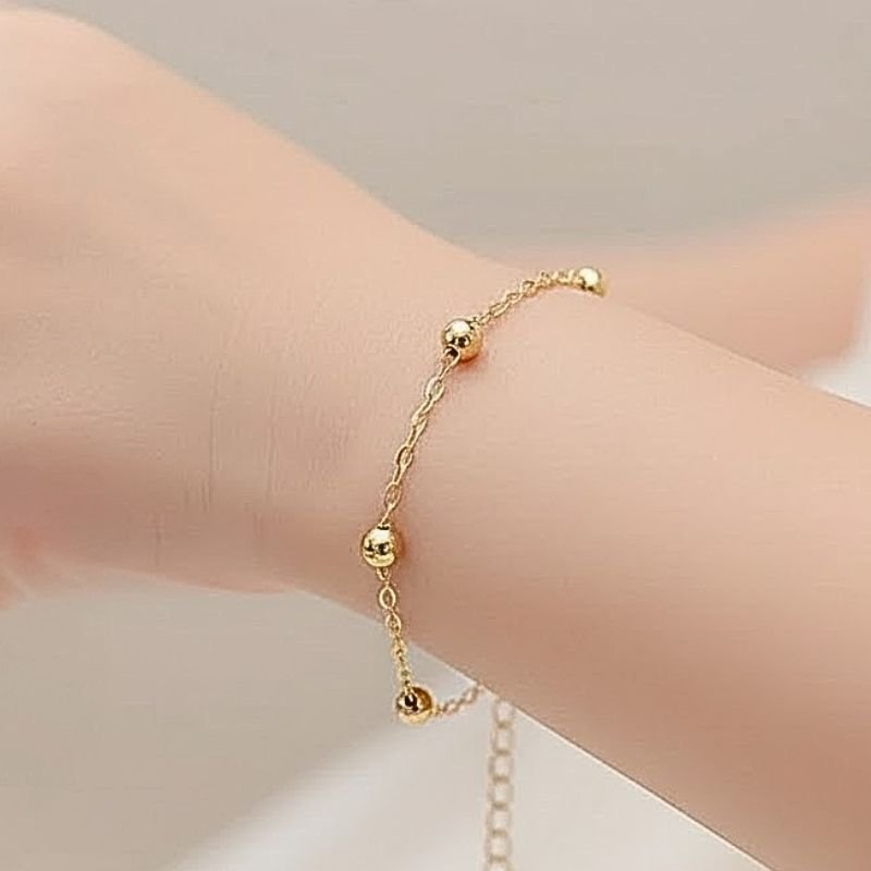 PULSEIRA INFANTIL BOLINHAS