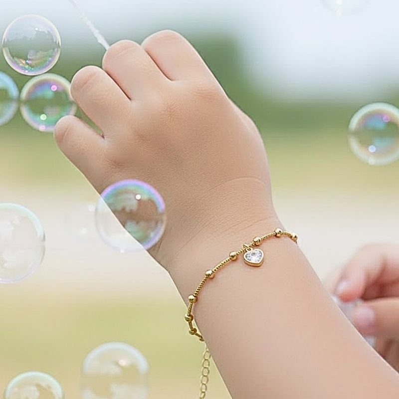 PULSEIRA INFANTIL BOLINHAS E CORAÇÃO