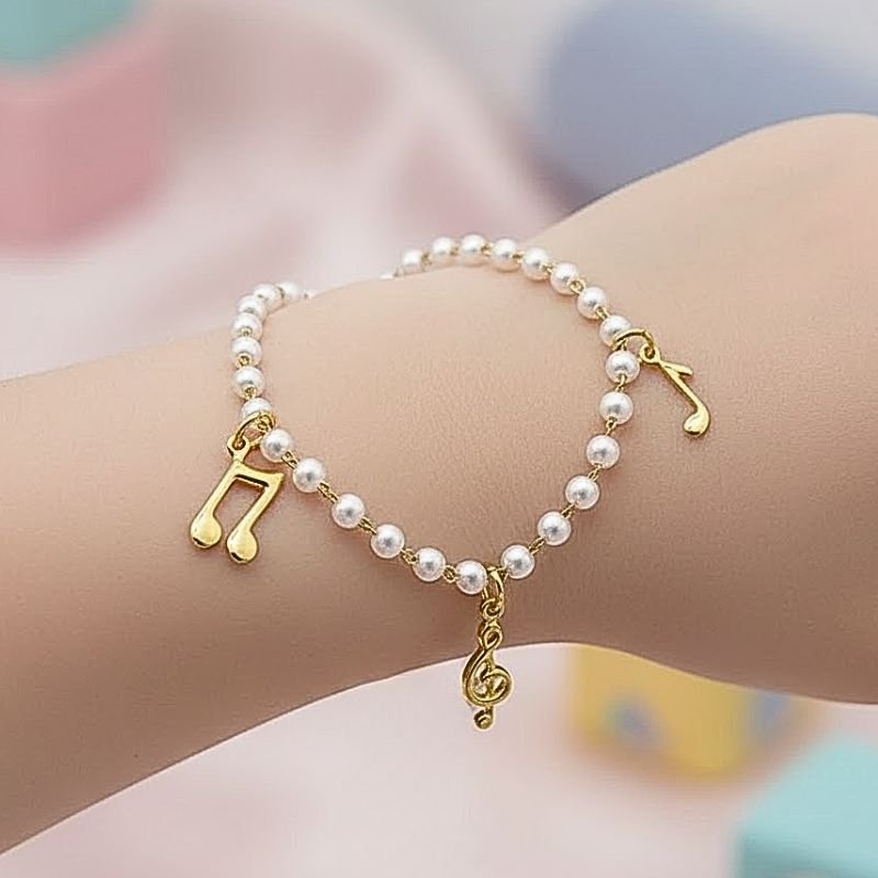 PULSEIRA INFANTIL NOTAS MUSICAIS PÉROLAS