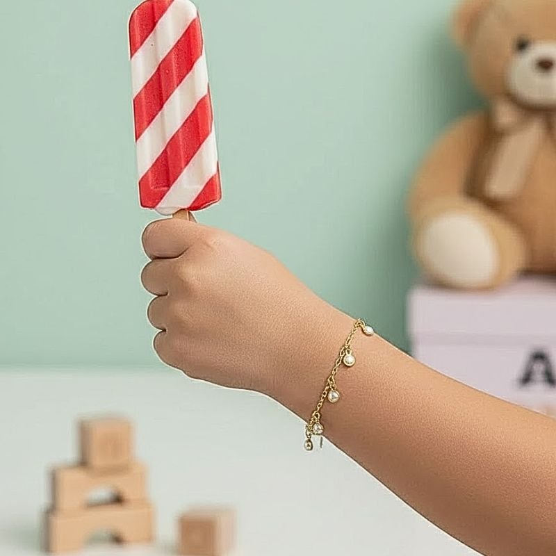 PULSEIRA INFANTIL PÉROLAS BANHADA A OURO