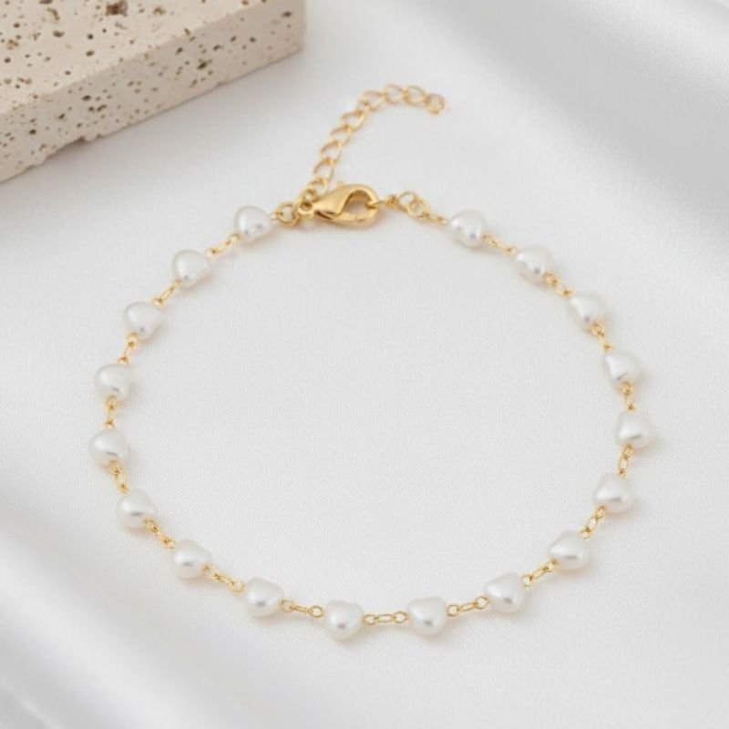 PULSEIRA MALHA CORAÇÕES EM PÉROLA