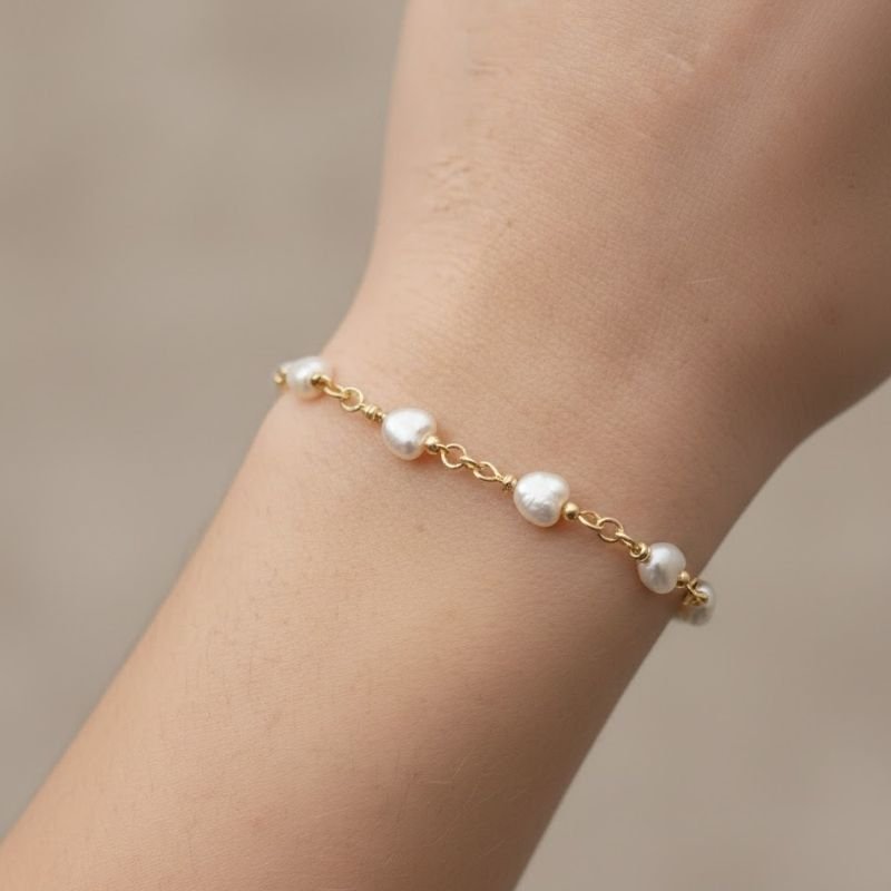 PULSEIRA MALHA CORAÇÕES EM PÉROLA