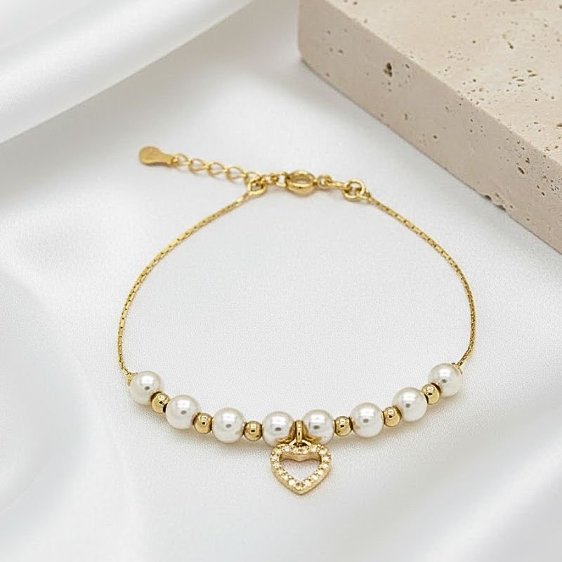 PULSEIRA PÉROLAS E CORAÇÃO